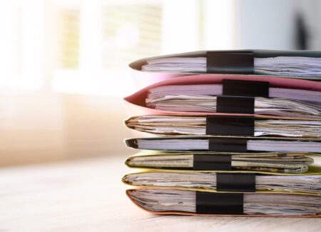 Documents in files placed on the office desk